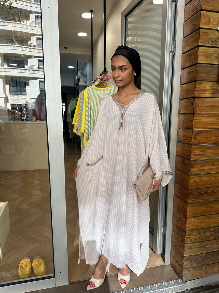 Abaya Authentica motif rayé rose nude
