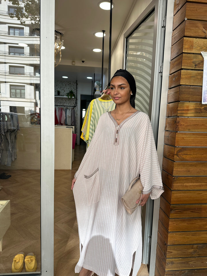 Abaya Authentica motif rayé rose nude